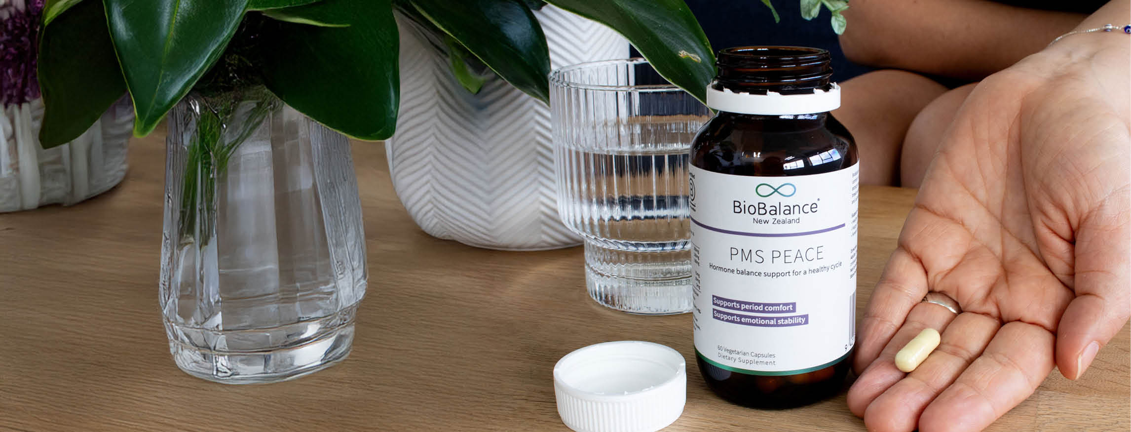 woman taking biobalance pms peace